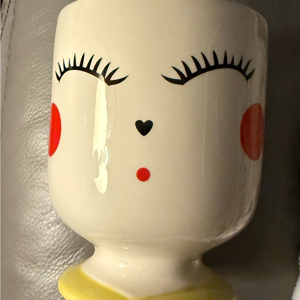 Charming Face Planter with Red Accents